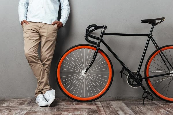  392531_970977_cropped_picture_african_man_standing_near_bicycle-1594249473686776958.jpg 