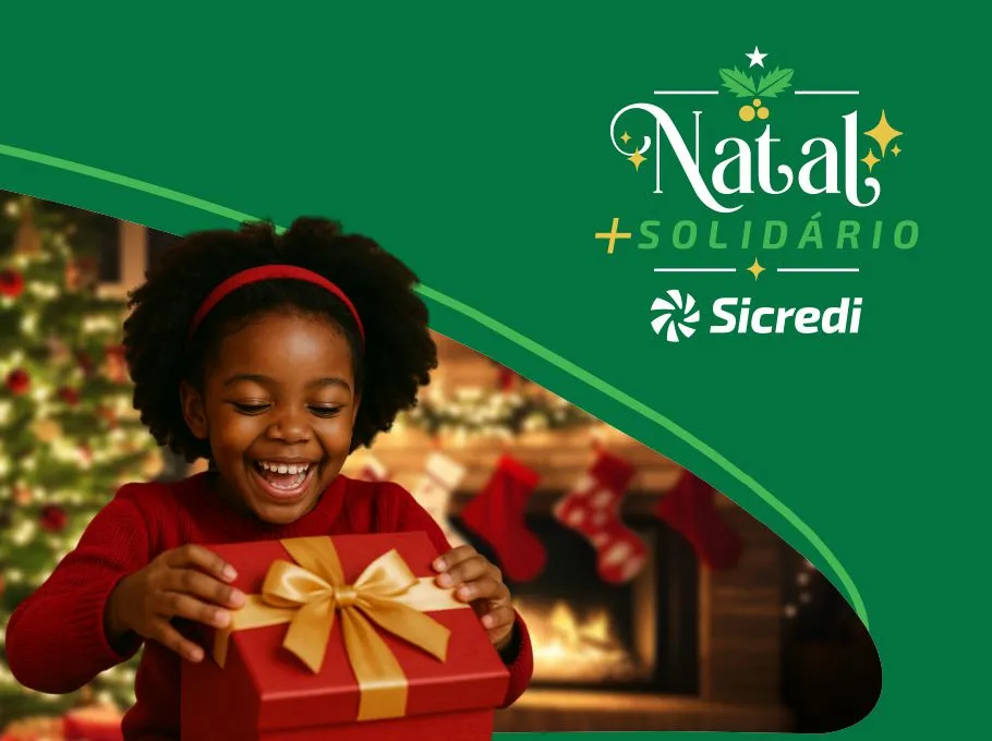  Criança feliz ao receber um presente de natal 