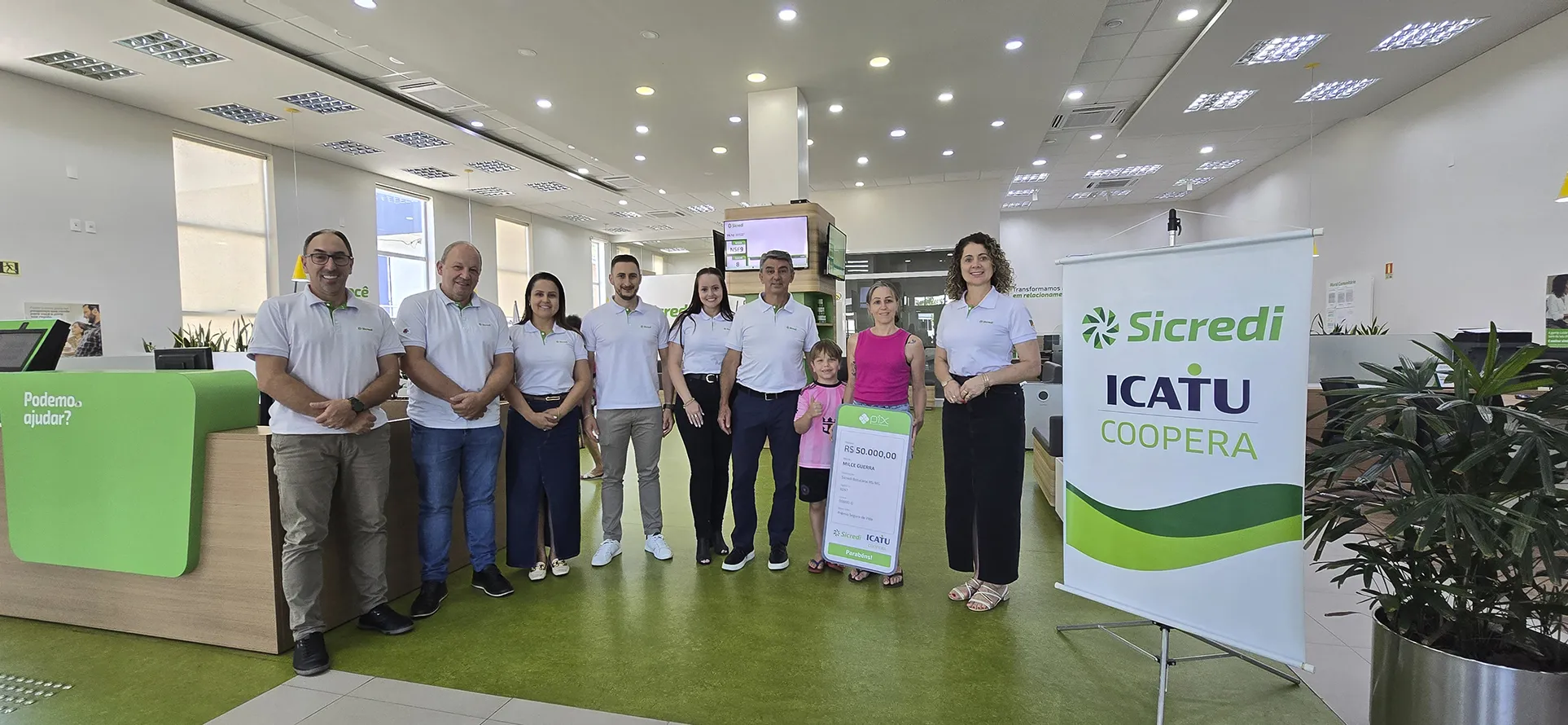  CAPA - Contemplada e colaboradores da ag NA 