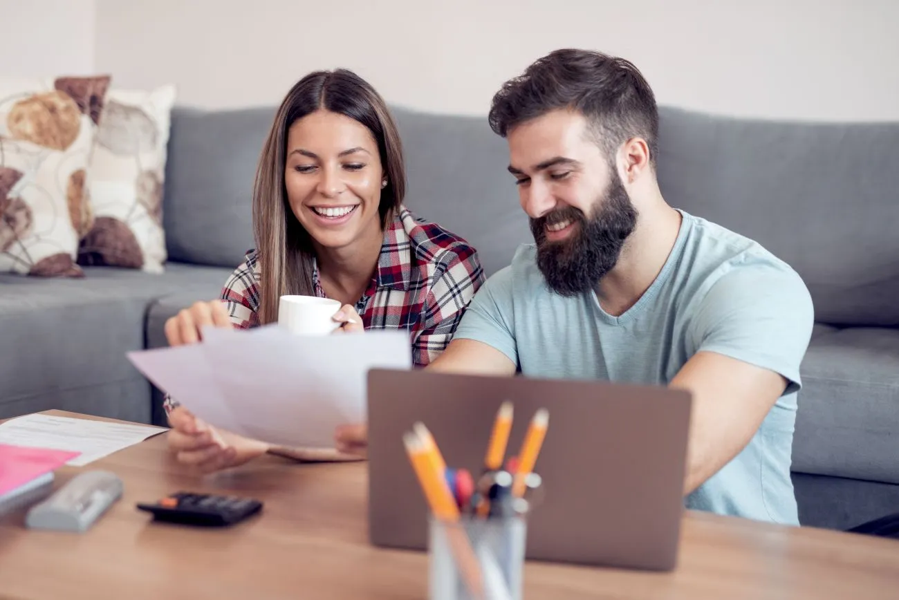  young-couple-calculating-bills-home 