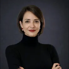  empreendedora no seu escritório com o Investimento BNDES 